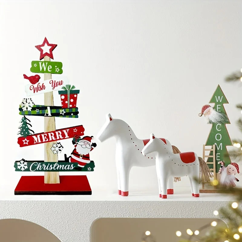 A small wooden Christmas tree with holiday decorations, Santa Claus, and gift designs, made of wood for holiday decorations